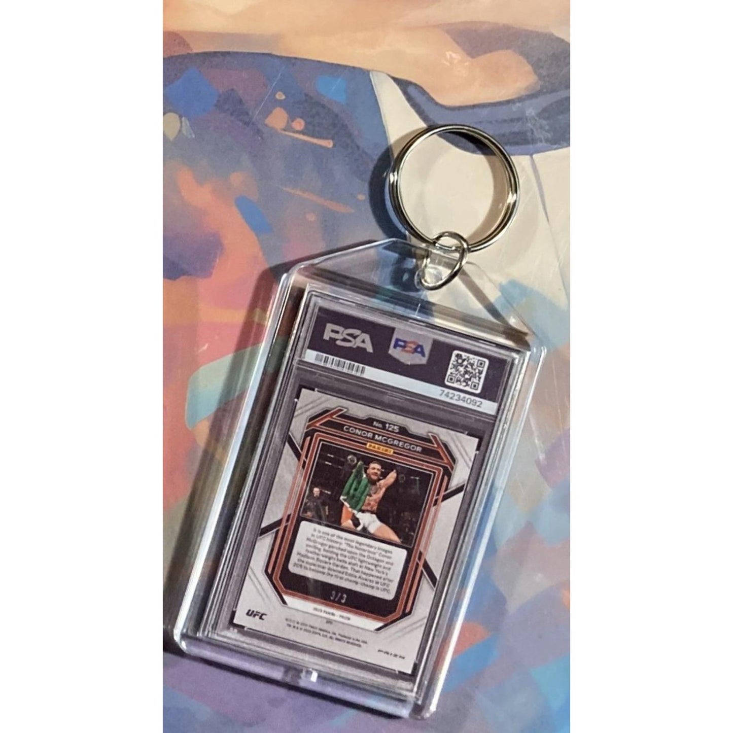 0140 Conor McGregor 2023 Panini UFC Prizm Gold Shimmer FOTL Novelty Keychain