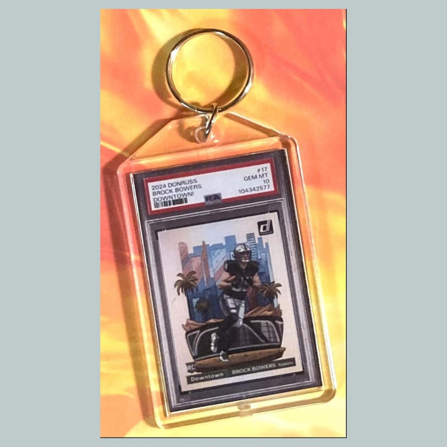3695 Brock Bowers 2024 Panini Donruss Downtown Custom Hand Made Keychain FBL