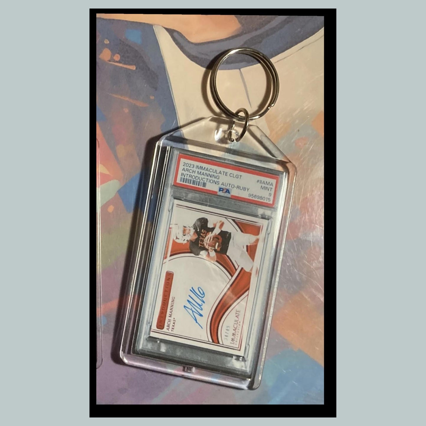 0538 Arch Manning 2023 Panini Immaculate Introductions Ruby Auto Custom Keychain