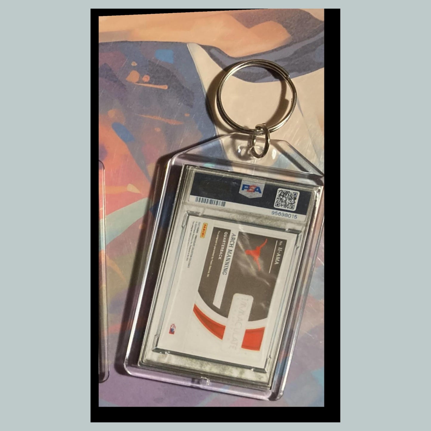 0538 Arch Manning 2023 Panini Immaculate Introductions Ruby Auto Custom Keychain