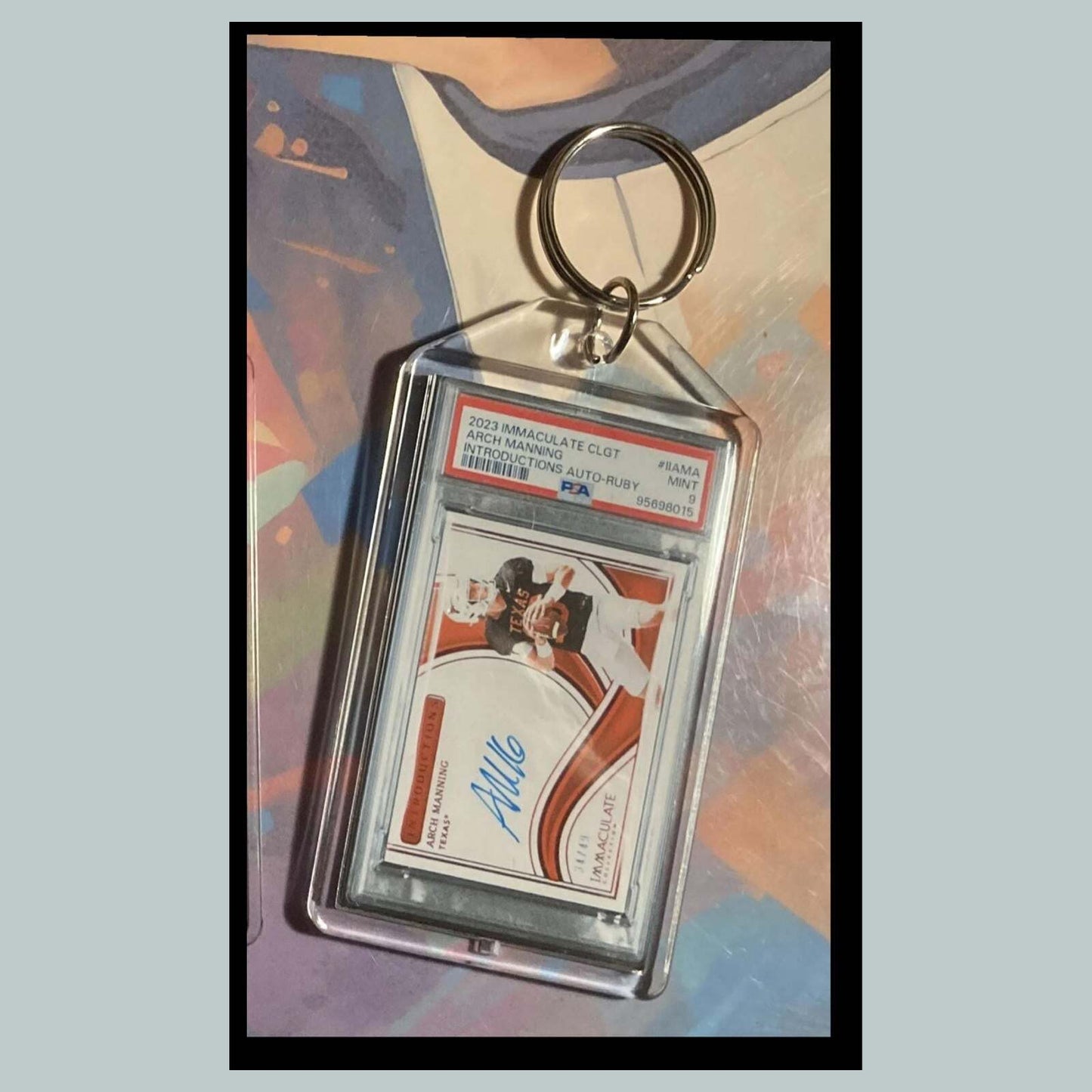 3495 Arch Manning 2023 Panini Immaculate Introductions Ruby Auto Custom Keychain FBL