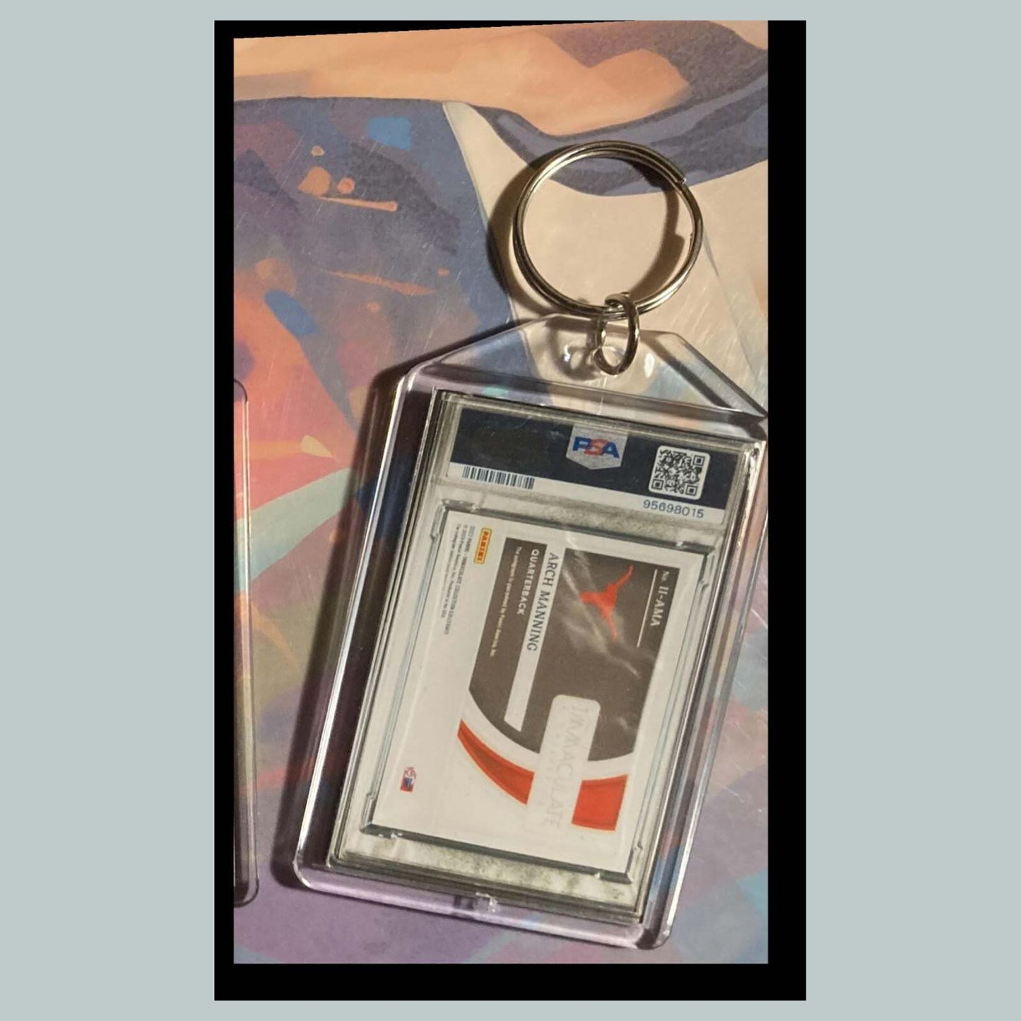 3495 Arch Manning 2023 Panini Immaculate Introductions Ruby Auto Custom Keychain FBL